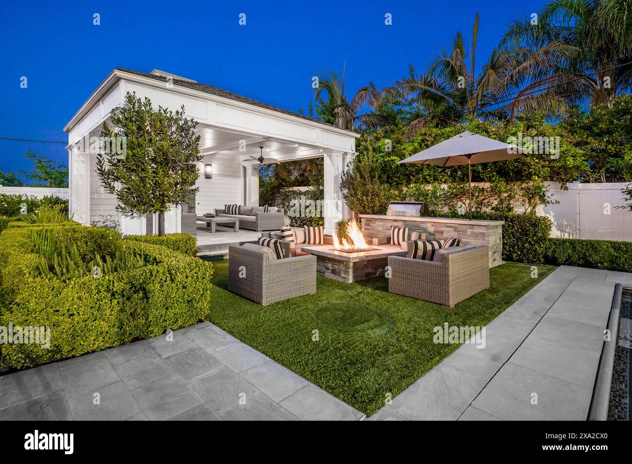 A backyard with a fire pit in a new construction home in Encino, California Stock Photo