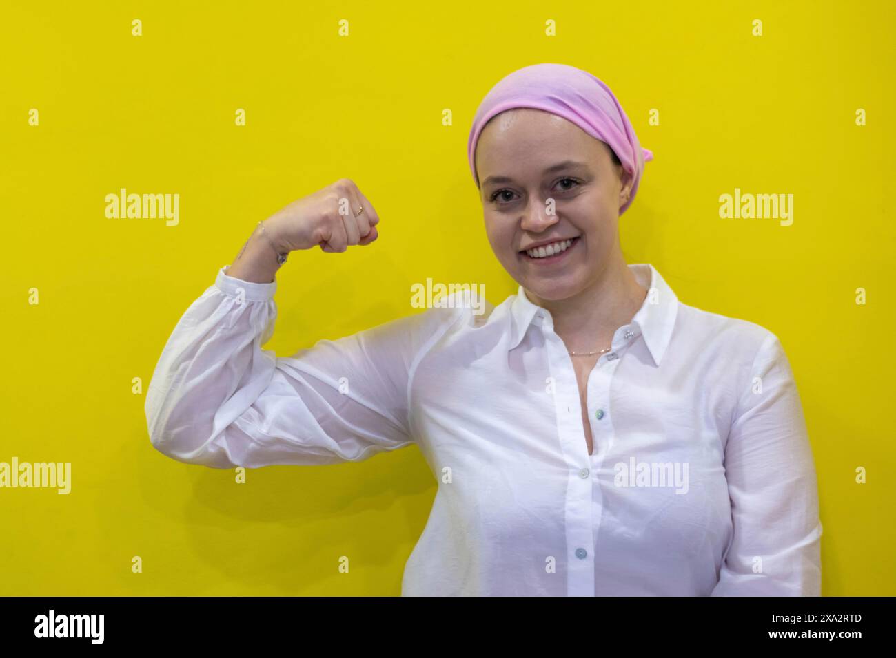 Medical and health concept. Healthy woman showing her fist of power