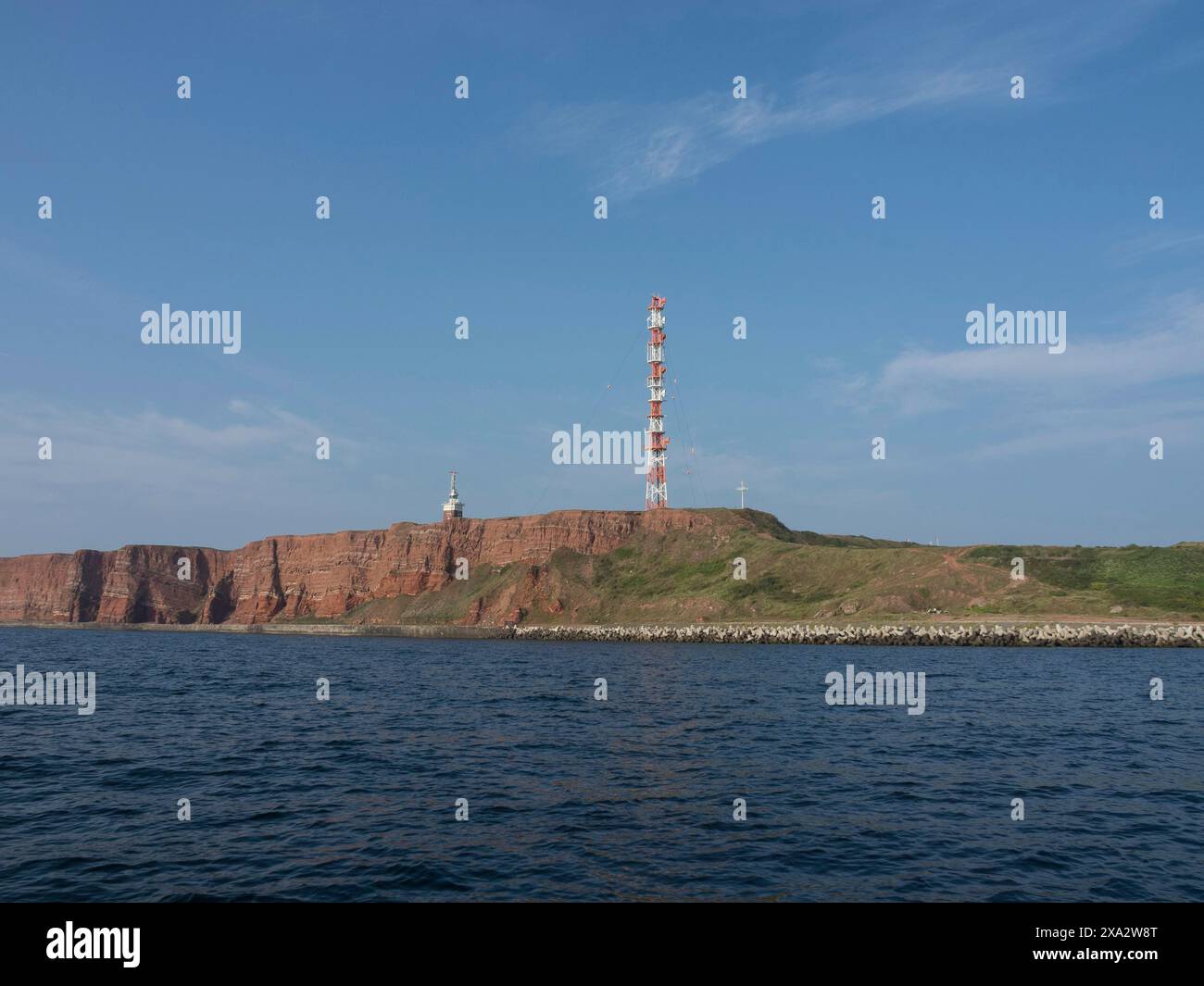 Rocky cliff calm sea hi-res stock photography and images - Alamy
