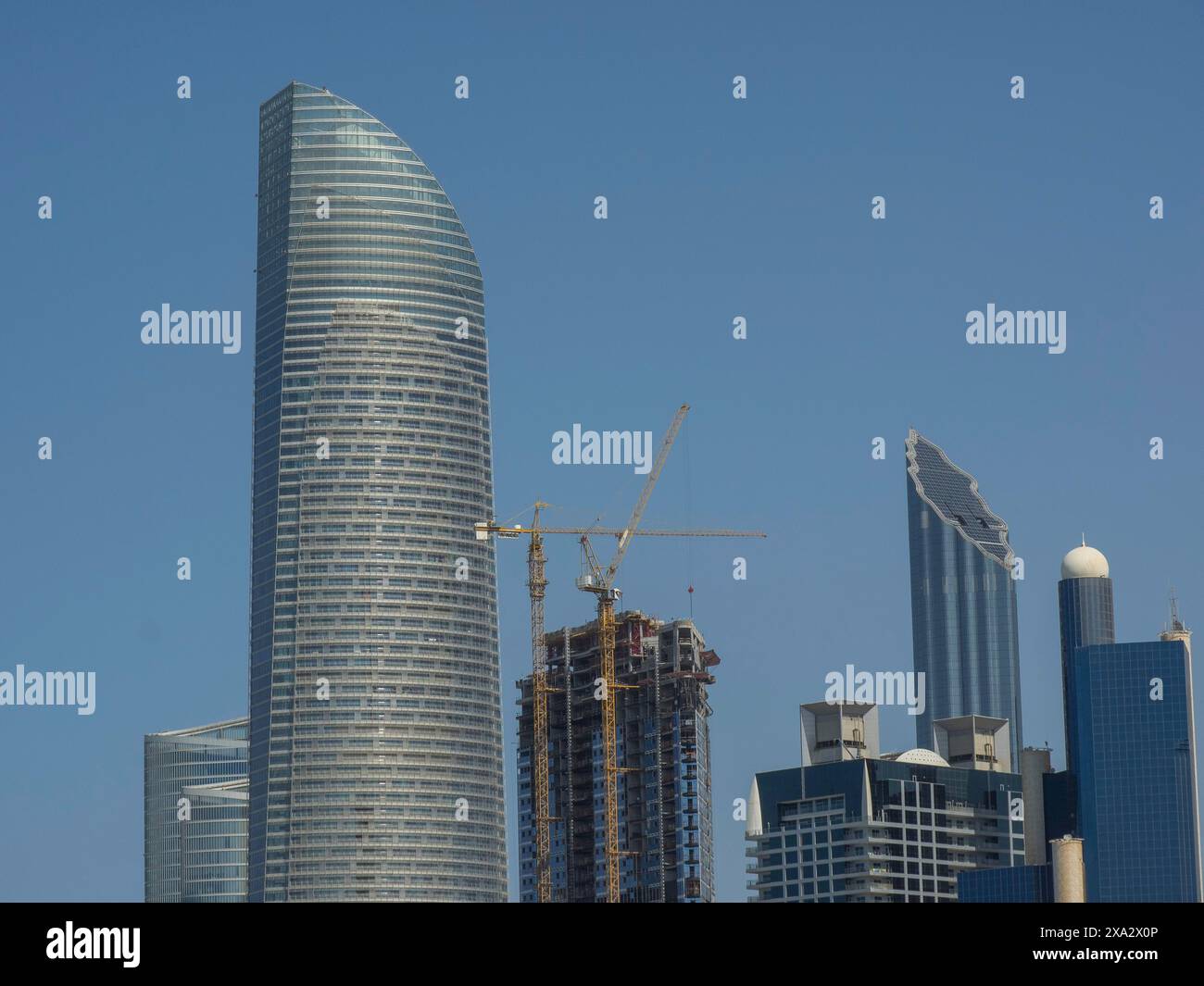 Skyscrapers and high-rise buildings with a crane in the construction ... - High-Rise Building Construction Phase
