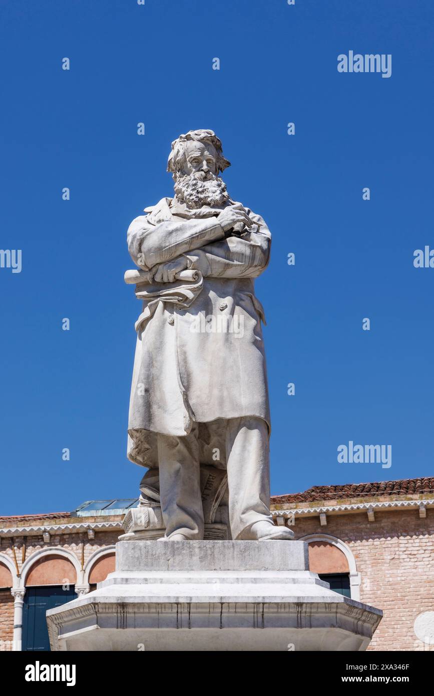 Venice, Venice Province, Veneto Region, Italy.  Statue of Niccolo Tommaseo, 1802 - 1874.  Dalmation born linguist and author. He was editor of the Diz Stock Photo