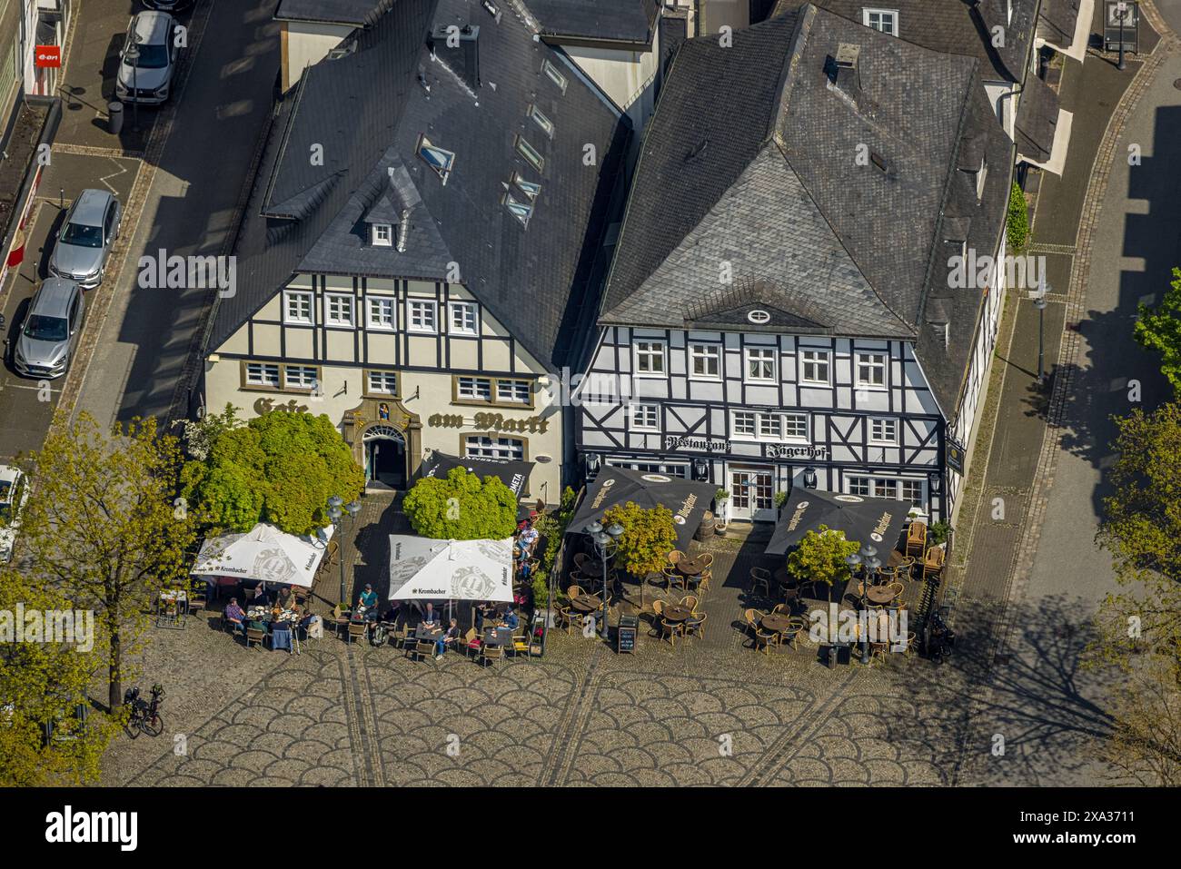 Aerial view, half-timbered houses with Restaurant Jägerhof and Café am Markt, market square and outdoor gastronomy, sunshades, Brilon, Sauerland, Nort Stock Photo