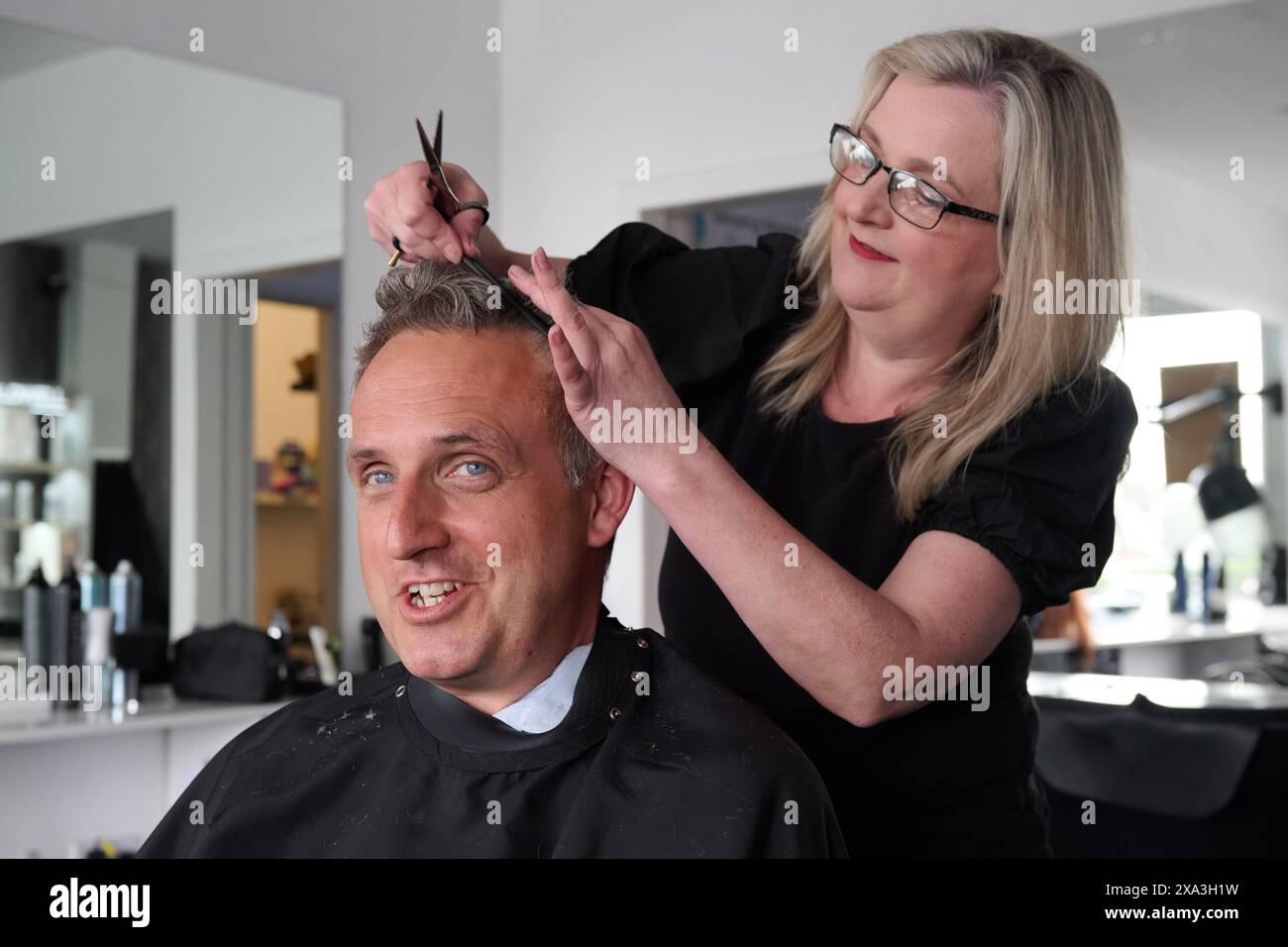 Edinburgh Scotland, UK 04 June 2024. Scottish Liberal Democrat leader Alex-Cole Hamilton at Campbell Young Hair Design to discuss his party's plans to boost growth and productivity as part of the General Election campaign. credit sst/alamy live news Stock Photo
