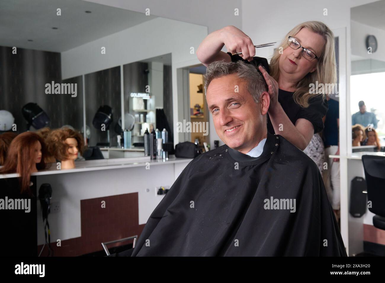 Edinburgh Scotland, UK 04 June 2024. Scottish Liberal Democrat leader Alex-Cole Hamilton at Campbell Young Hair Design to discuss his party's plans to boost growth and productivity as part of the General Election campaign. credit sst/alamy live news Stock Photo