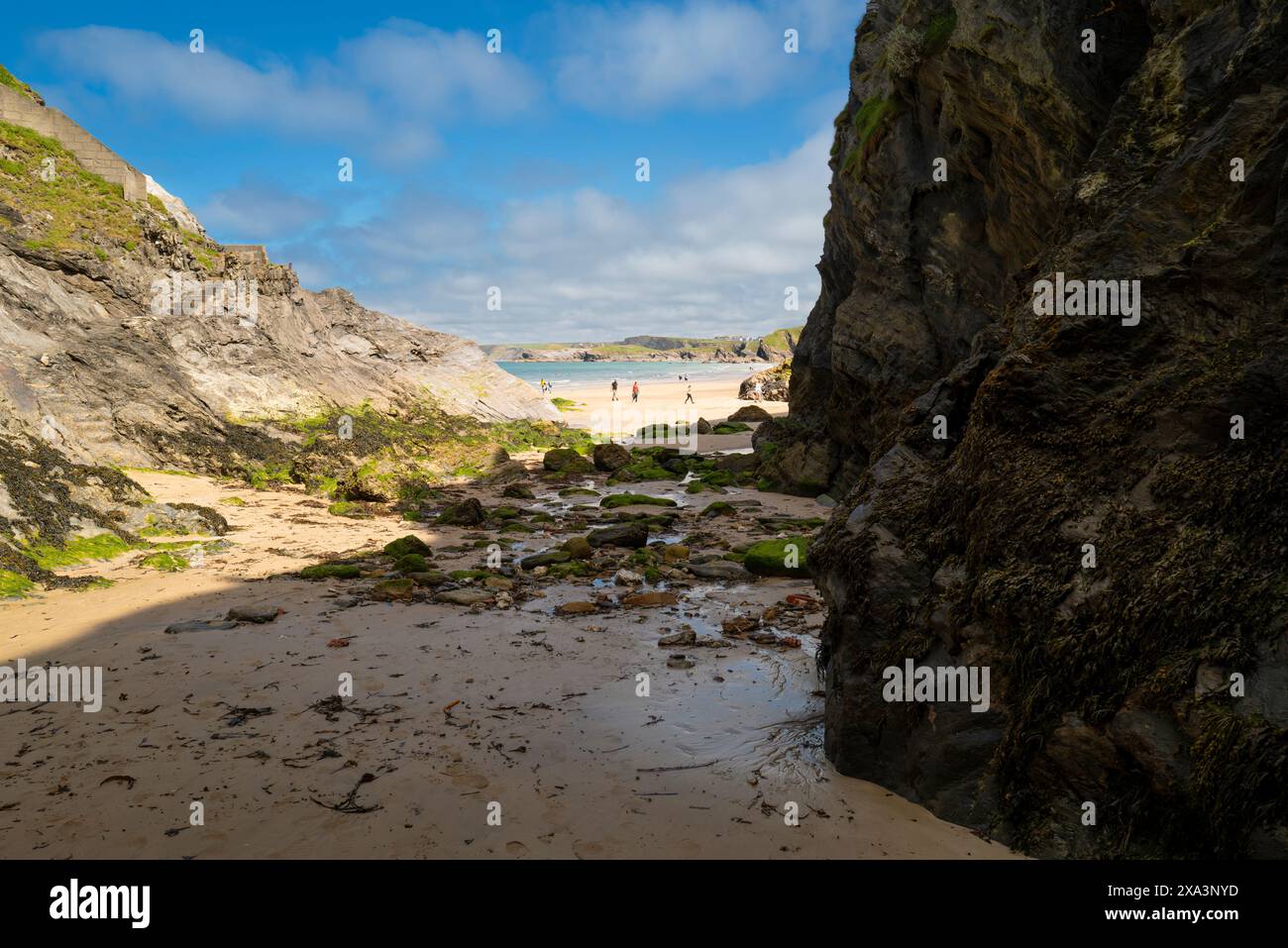 The rugged rocks below cliffs on Great Western Gt Western beach in ...