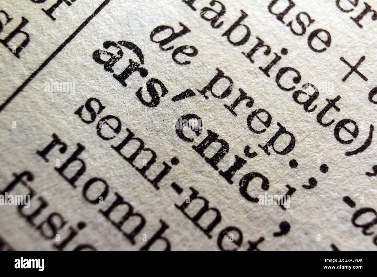 Word arsenic on dictionary page, macro close-up Stock Photo