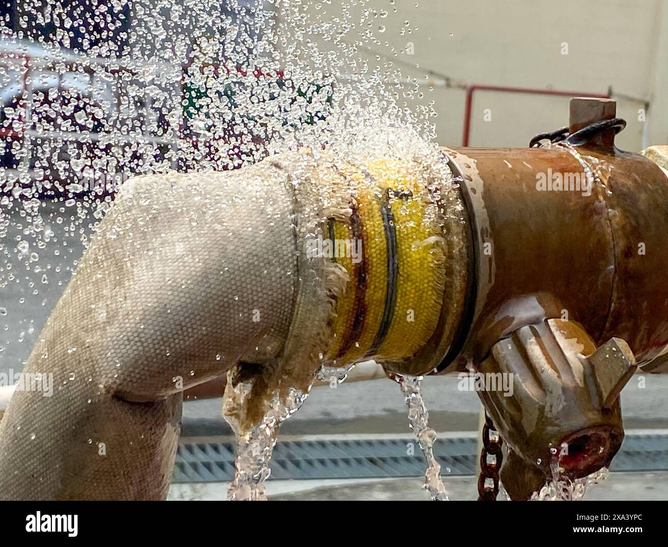 Water leaking at the joints of canvas hose pipe Stock Photo - Alamy