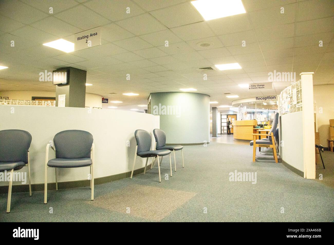 Empty Spacious waiting area with chairs and bulletin boards in a medical practise Stock Photo