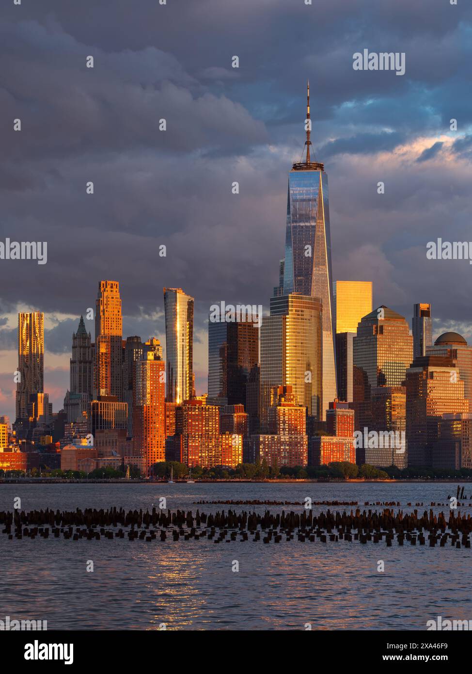 New York City skyline at sunset from the Hudson River with World Trade ...