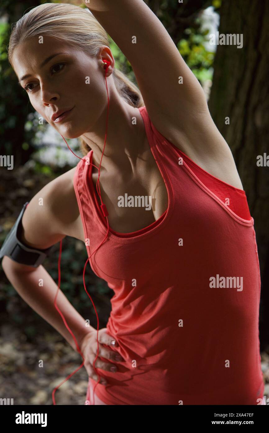 Fit woman stretching hand hi-res stock photography and images - Alamy
