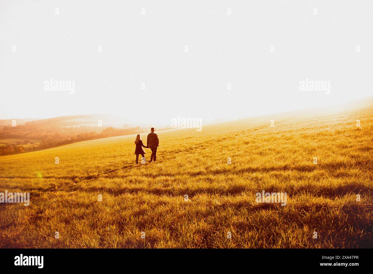 Two people walking uphill hi-res stock photography and images - Alamy