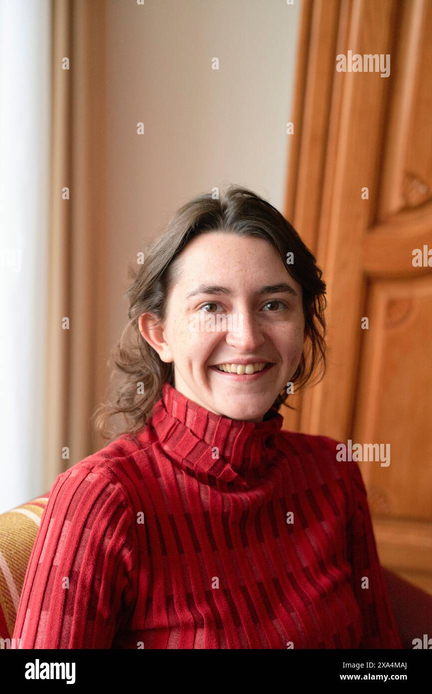 Woman in red sweater on hi-res stock photography and images - Alamy