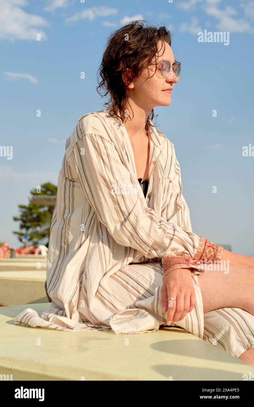 Woman in a blue shirt hi-res stock photography and images - Alamy