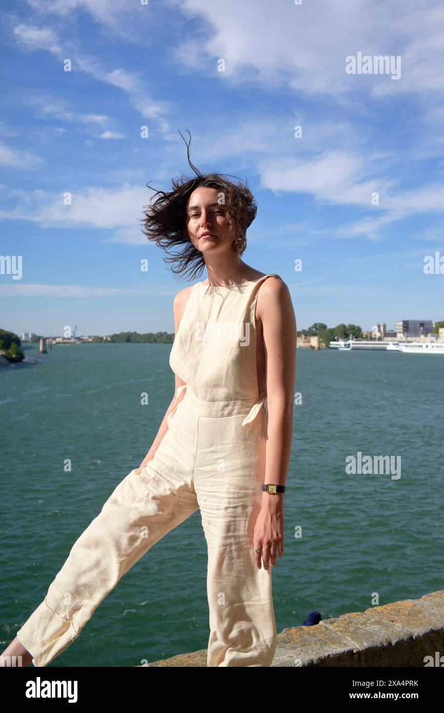 Female wearing beige top hi-res stock photography and images - Alamy