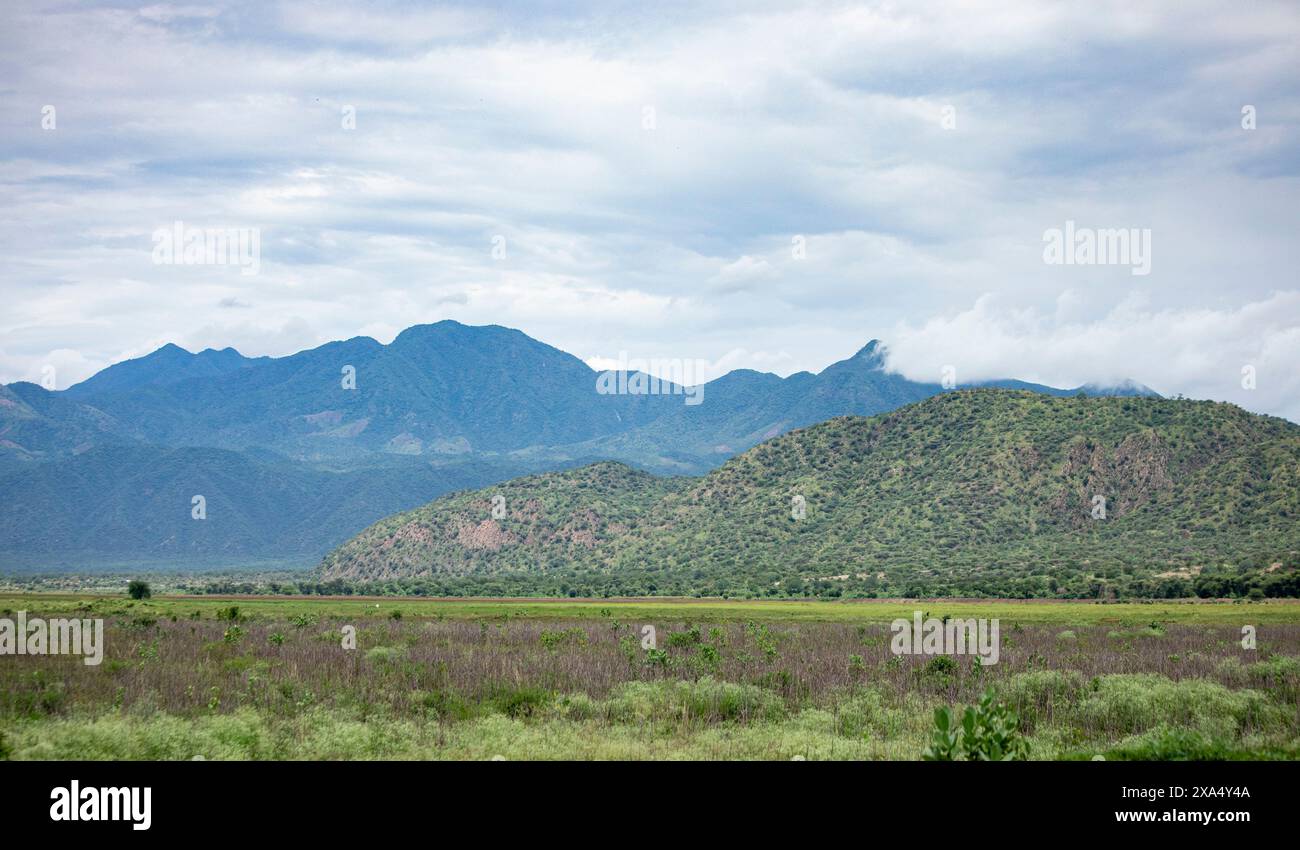 Farmland surrounded by mountains in Southern Ethiopia near Jinka. Stock Photo