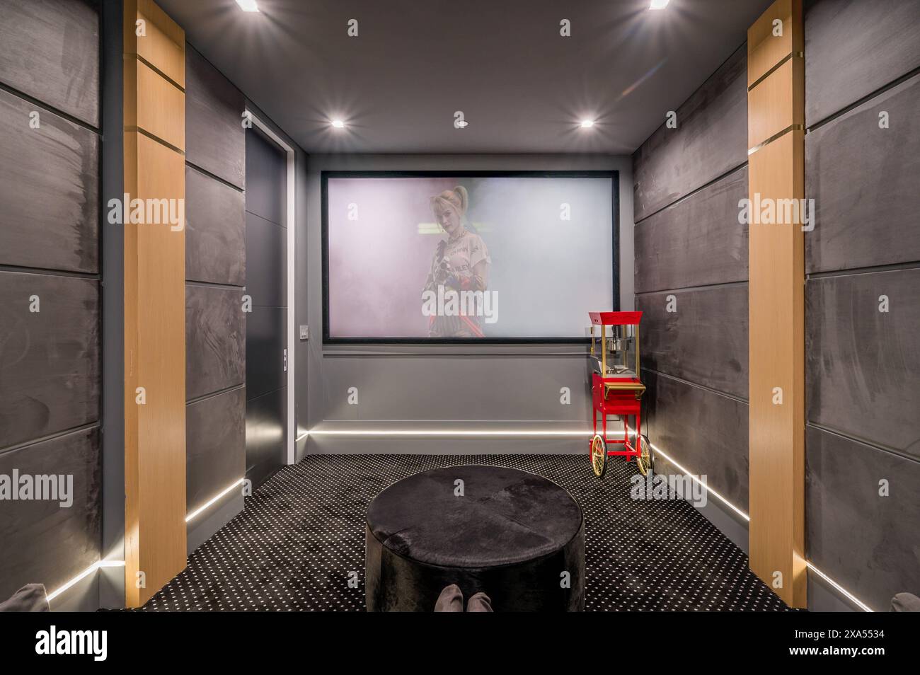 Interior of a cinema hall with a blank screen in motion on a wall Stock ...