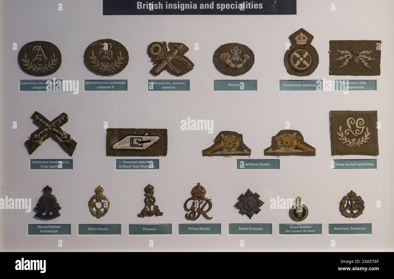Detail of the different patches and insignia of the British Specialties in the museum of the battle of normandy. Second World War Stock Photo