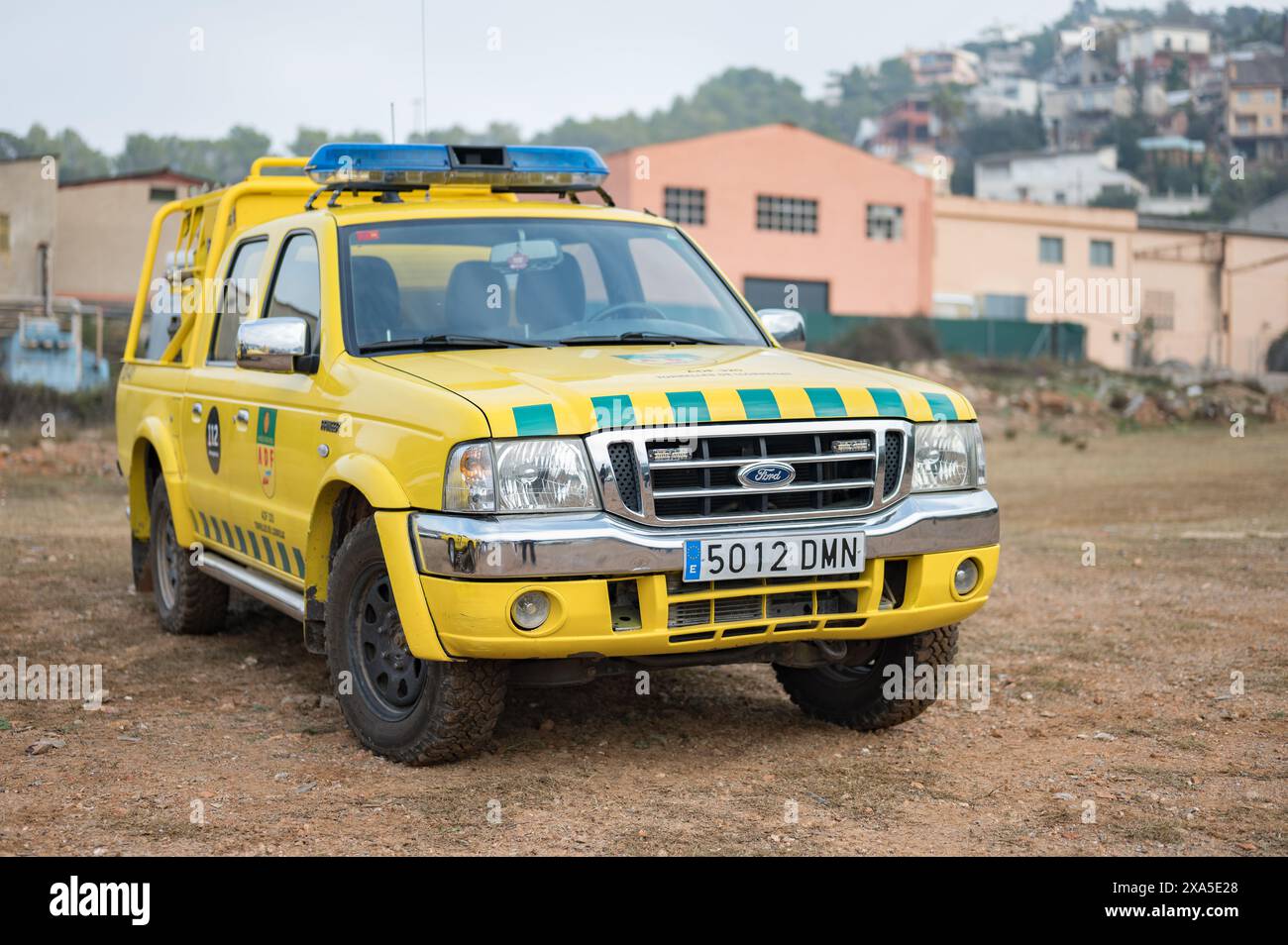 Detail of the yellow Ford Ranger pickup off-road vehicle with sirens from the town's forestry defense group Stock Photo