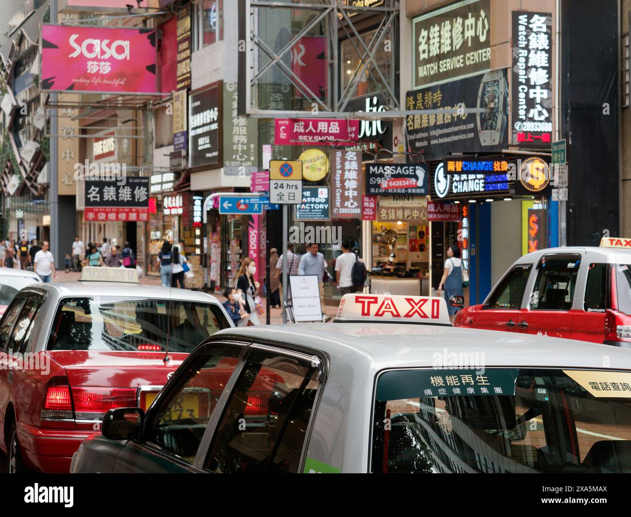 View of a line of Hong Kong taxis queuing at a taxi rank Stock Photo Alamy