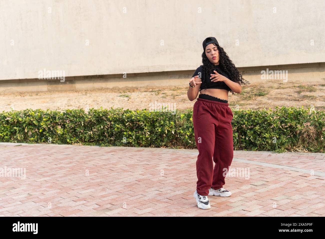 Woman dancing outdoors hi-res stock photography and images - Alamy