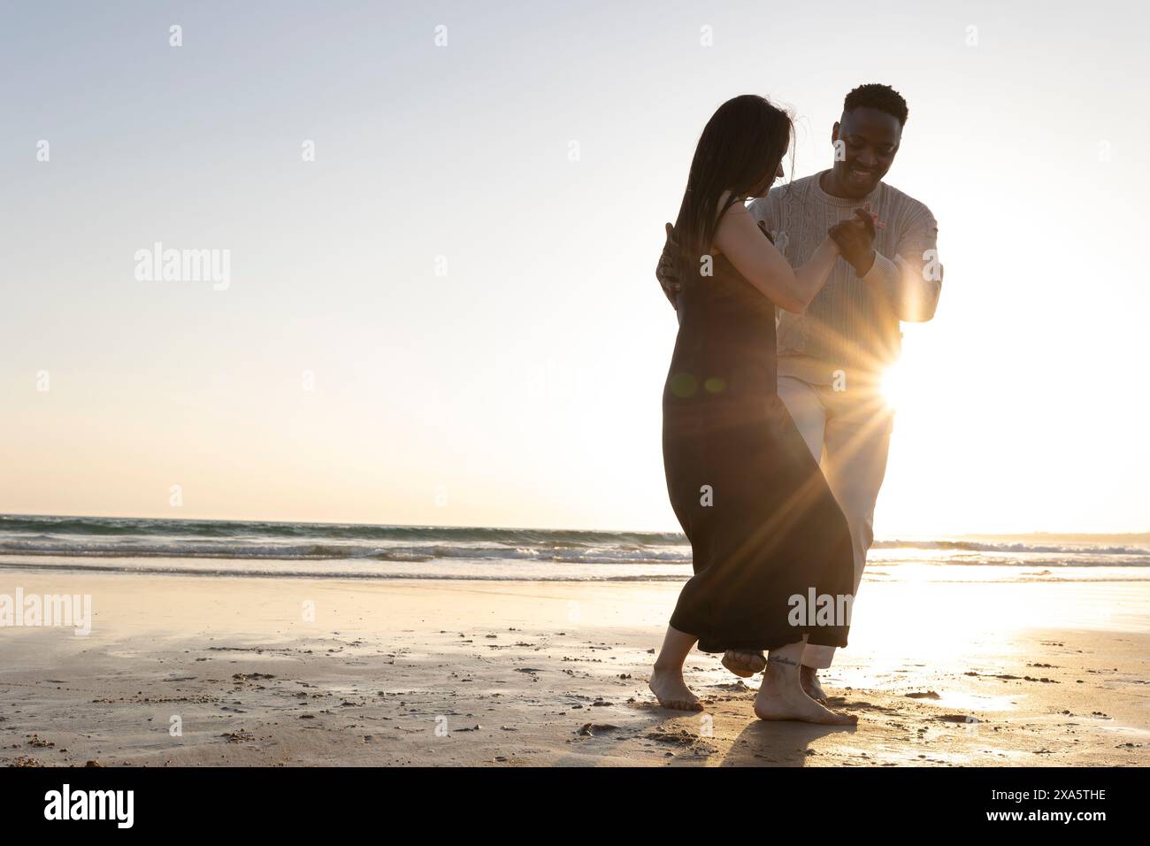 Two beautiful women dancing beach hi-res stock photography and images ...