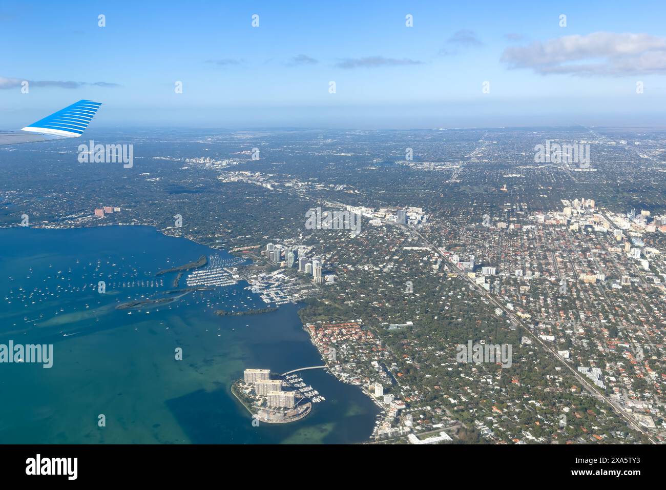 Coconut Grove & Coral Gables in the Miami metraopolitan area in Florida.  Grove Isle is in front with the Dinner Key Marina behind. Stock Photo