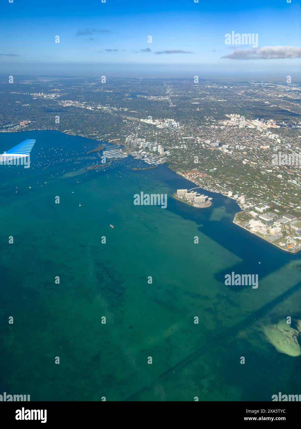 Coconut Grove & Coral Gables in the Miami metraopolitan area in Florida.  Grove Isle is at right with the Dinner Key Marina at left. Stock Photo