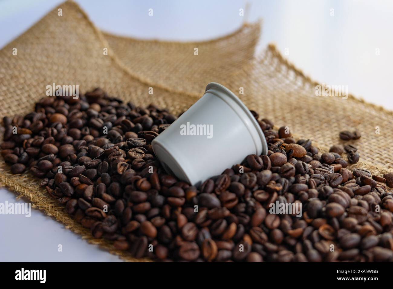 Coffee beans in a can with burlock jute Stock Photo