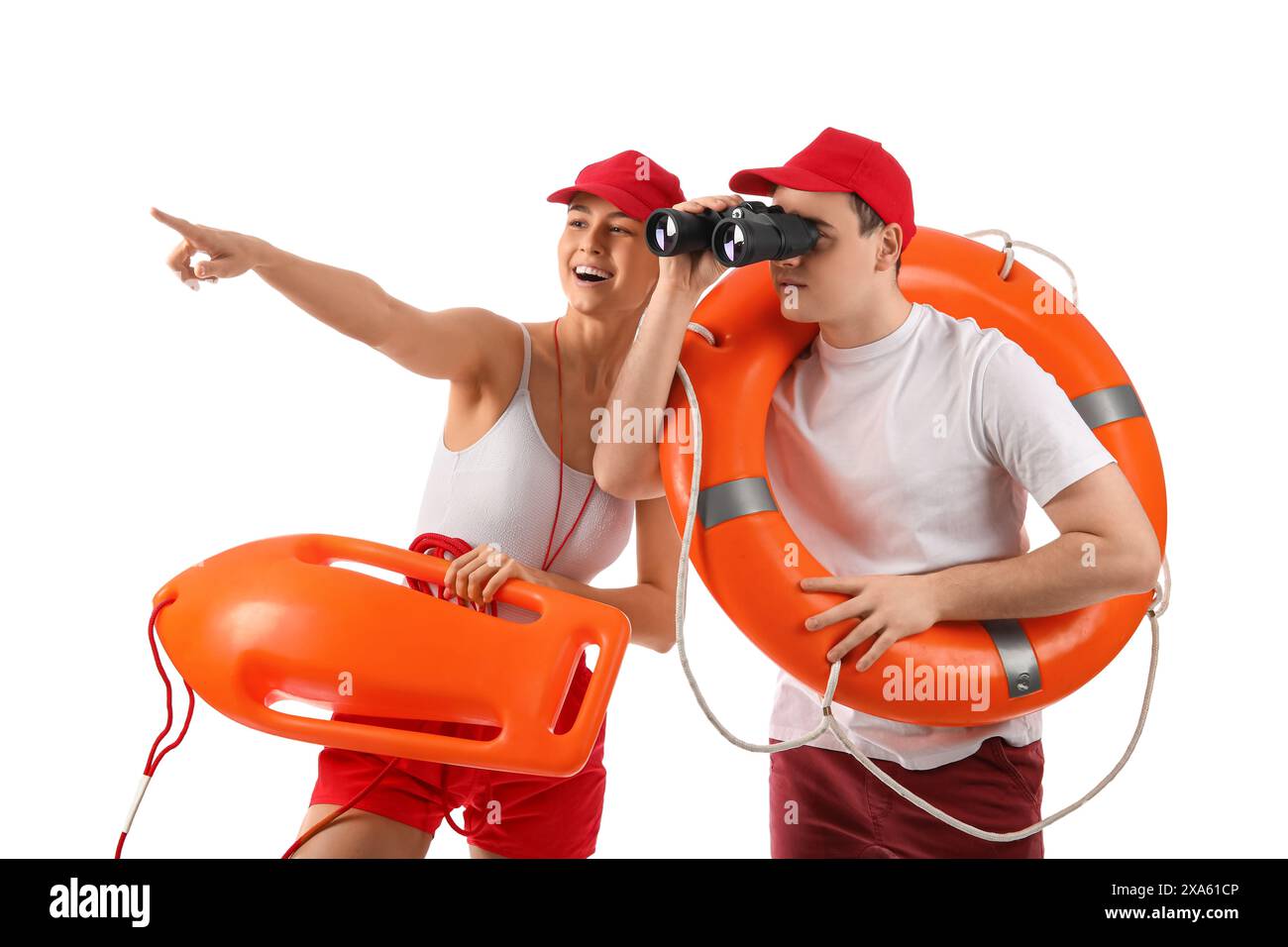 Lifeguards with ring buoy, rescue tube and binoculars spotted something on white background Stock Photo