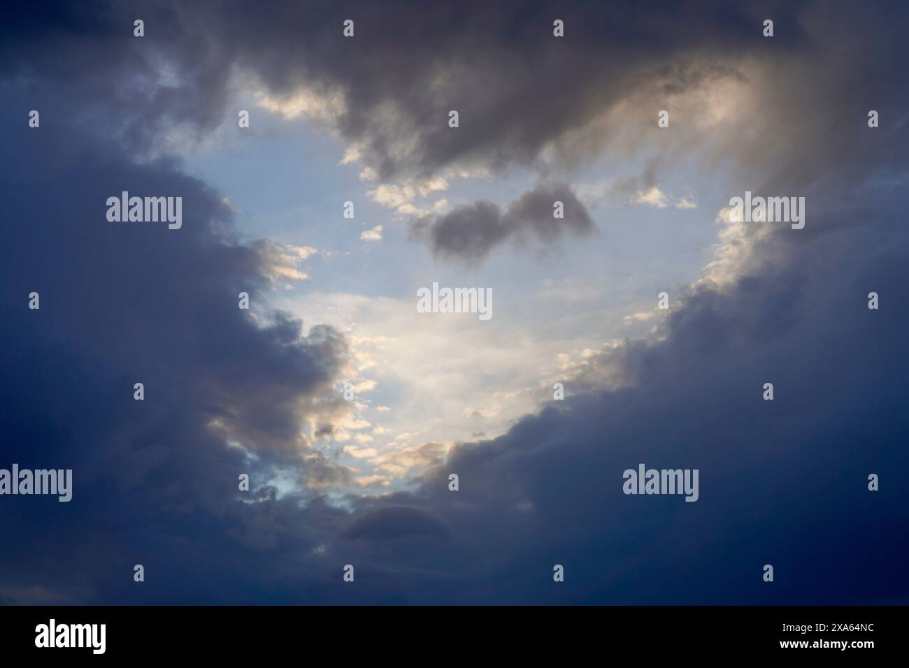 The Blue sky with white clouds forming a heart shape Stock Photo - Alamy