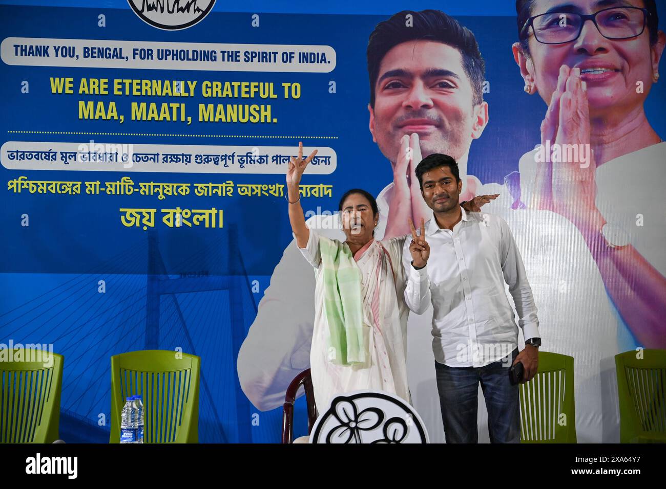 Kolkata, India. 04th June, 2024. Chief Minister of India's West Bengal state and Trinamool Congress (TMC) party leader Mamata Banerjee (L) with her nephew Abhishek Banerjee, the National General Secretary of All India Trinamool Congress gesture after a win in the majority of seats in the Lok Sabha election 2024 in the state of West Bengal. Credit: SOPA Images Limited/Alamy Live News Stock Photo