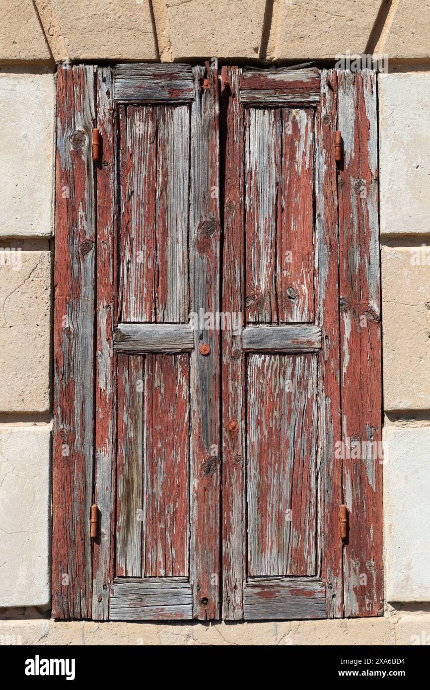Old wooden door set in stone wall Stock Photo - Alamy