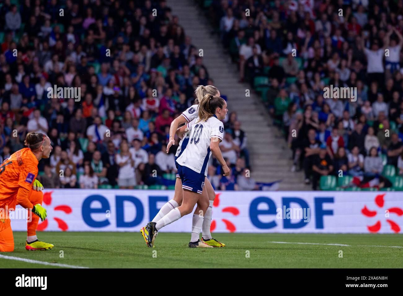 Saint Etienne, France. 04th June, 2024. Alessia Russo (9 England) and Ella Toone (10 England) celebrate after scoring during the Womens European Qualifiers match between France and England at Stade Geoffroy-Guichard in Saint-Etienne, France. (Pauline FIGUET/SPP) Credit: SPP Sport Press Photo. /Alamy Live News Stock Photo