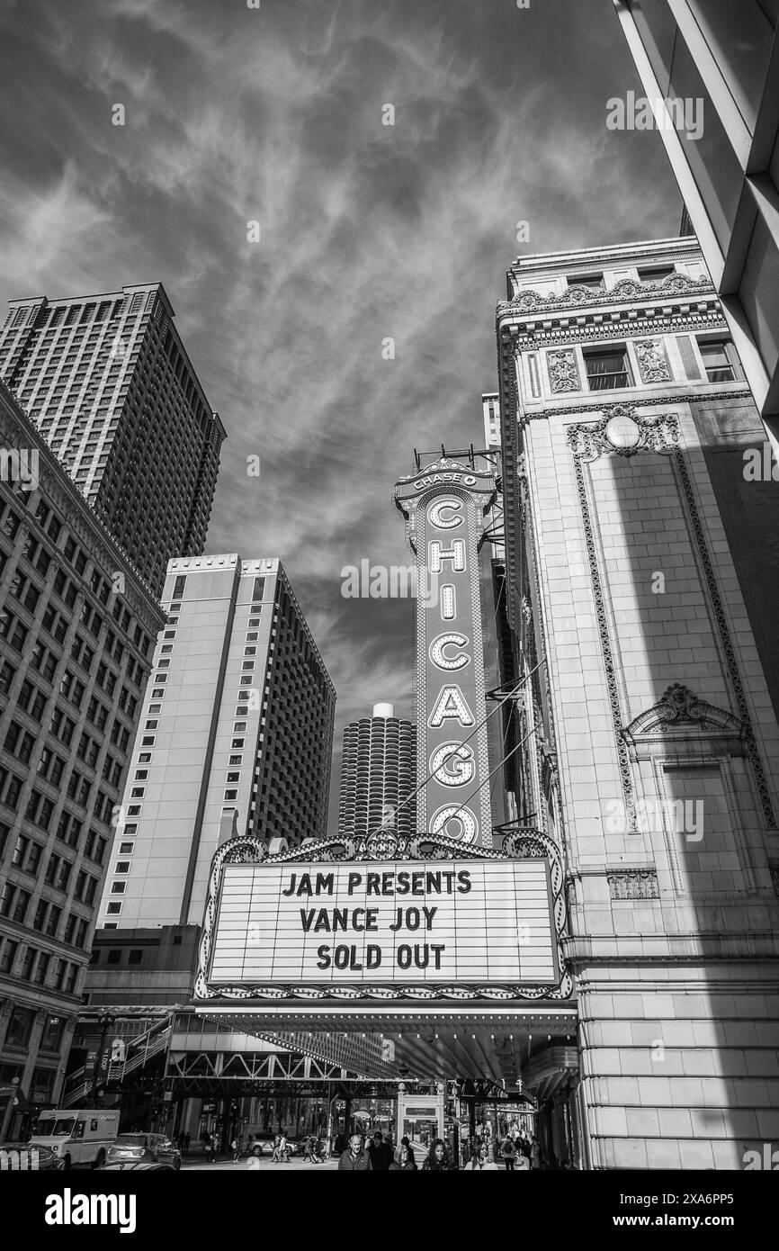 A Chicago theater marquee in urban setting with skyline Stock Photo