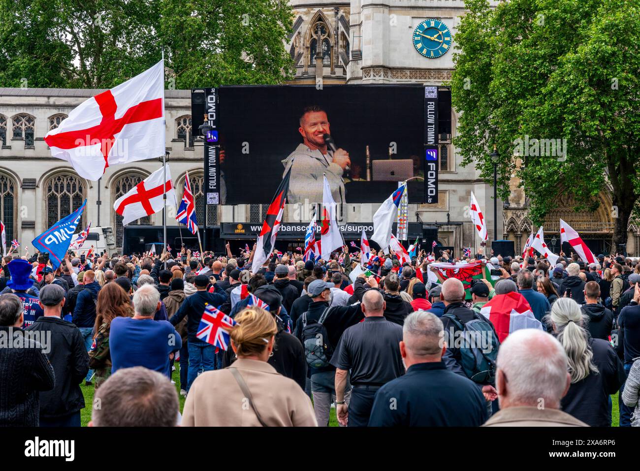 Political Activist Tommy Robinson Seen On The Big Screen Giving A ...