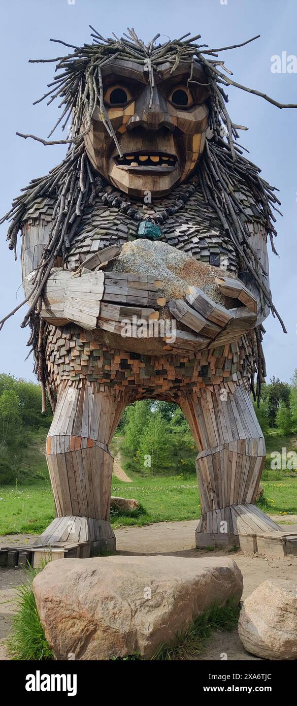 A vertical of one of Thomas Dambo's famous tree recycle trolls Stock Photo