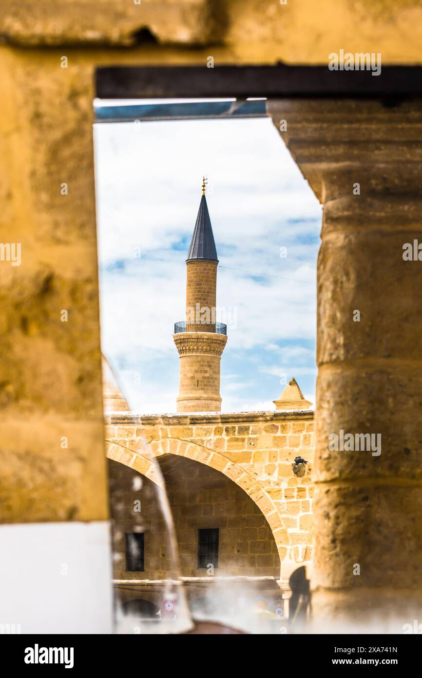 Reflection Minaret Selimiye Mosque, Büyük Han, Caravanserai, Nicosia, Nicosia District, Northern Cyprus Stock Photo