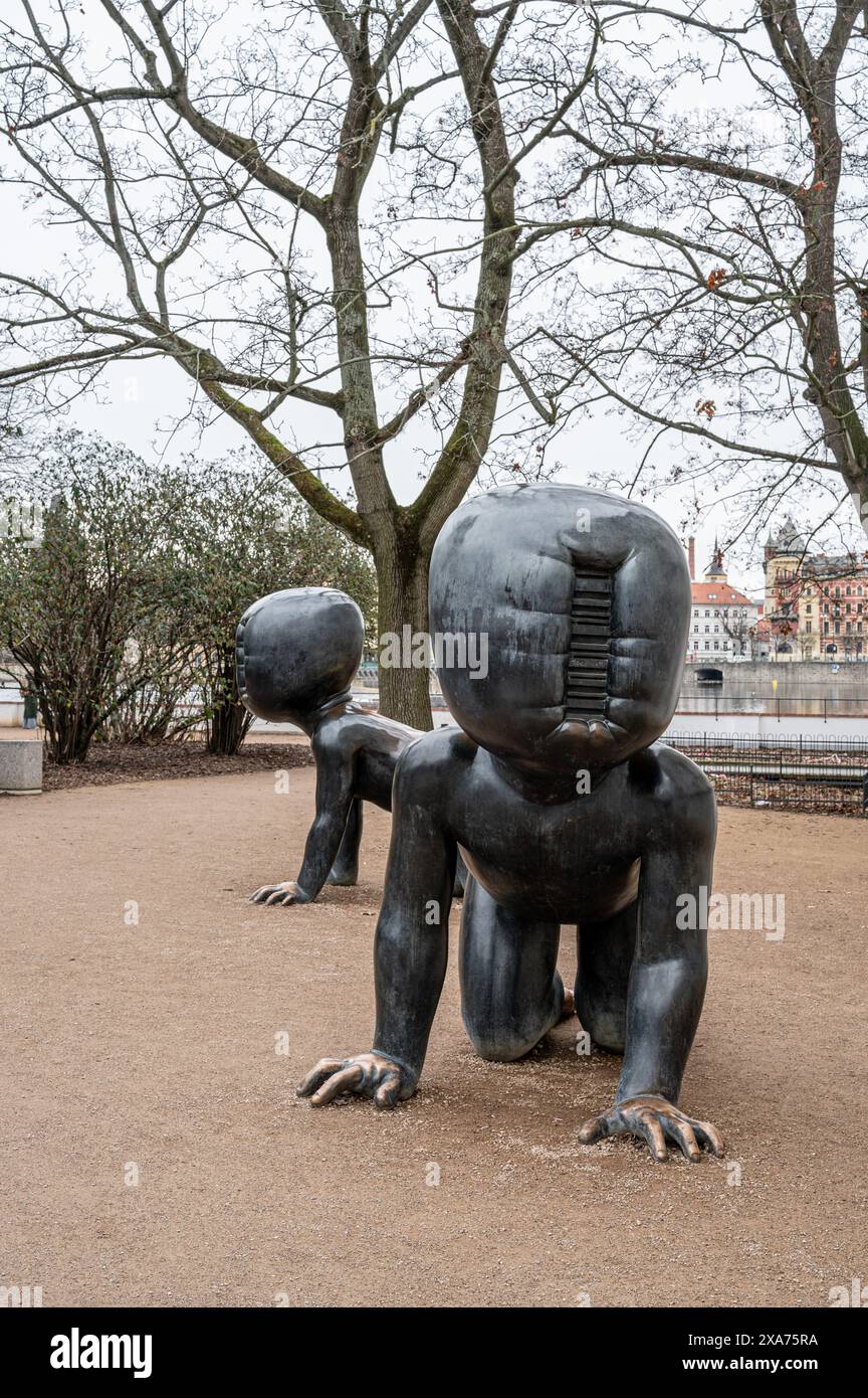 The modern Crawling Babies sculpture in a park in Prague Stock Photo