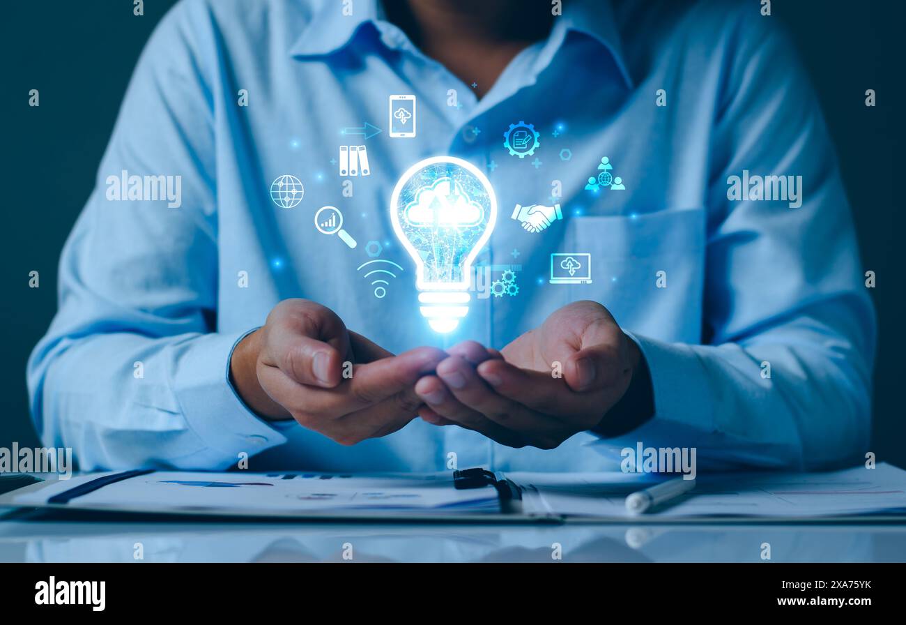 Businessman using cloud technology connect business data. Cloud computing concept idea show on hand. Internet Cloud technology. Digital Data storage. Stock Photo