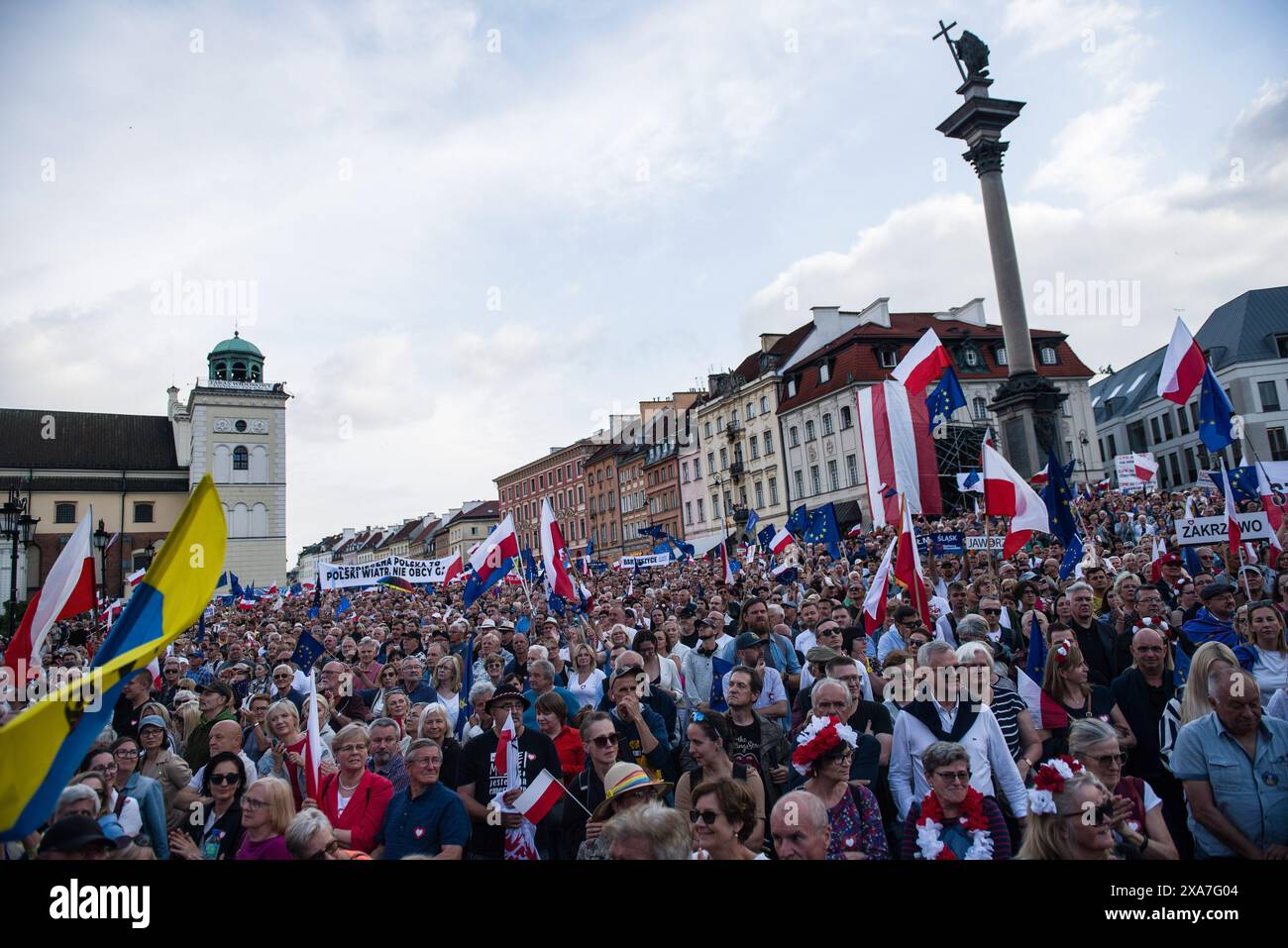 People wave Polish and EU flags during the pro-EU rally organised by ...