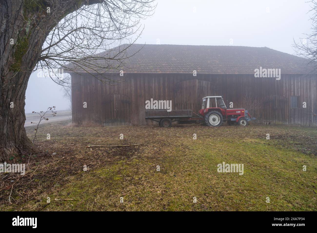 Tractor parked in barn hi-res stock photography and images - Alamy