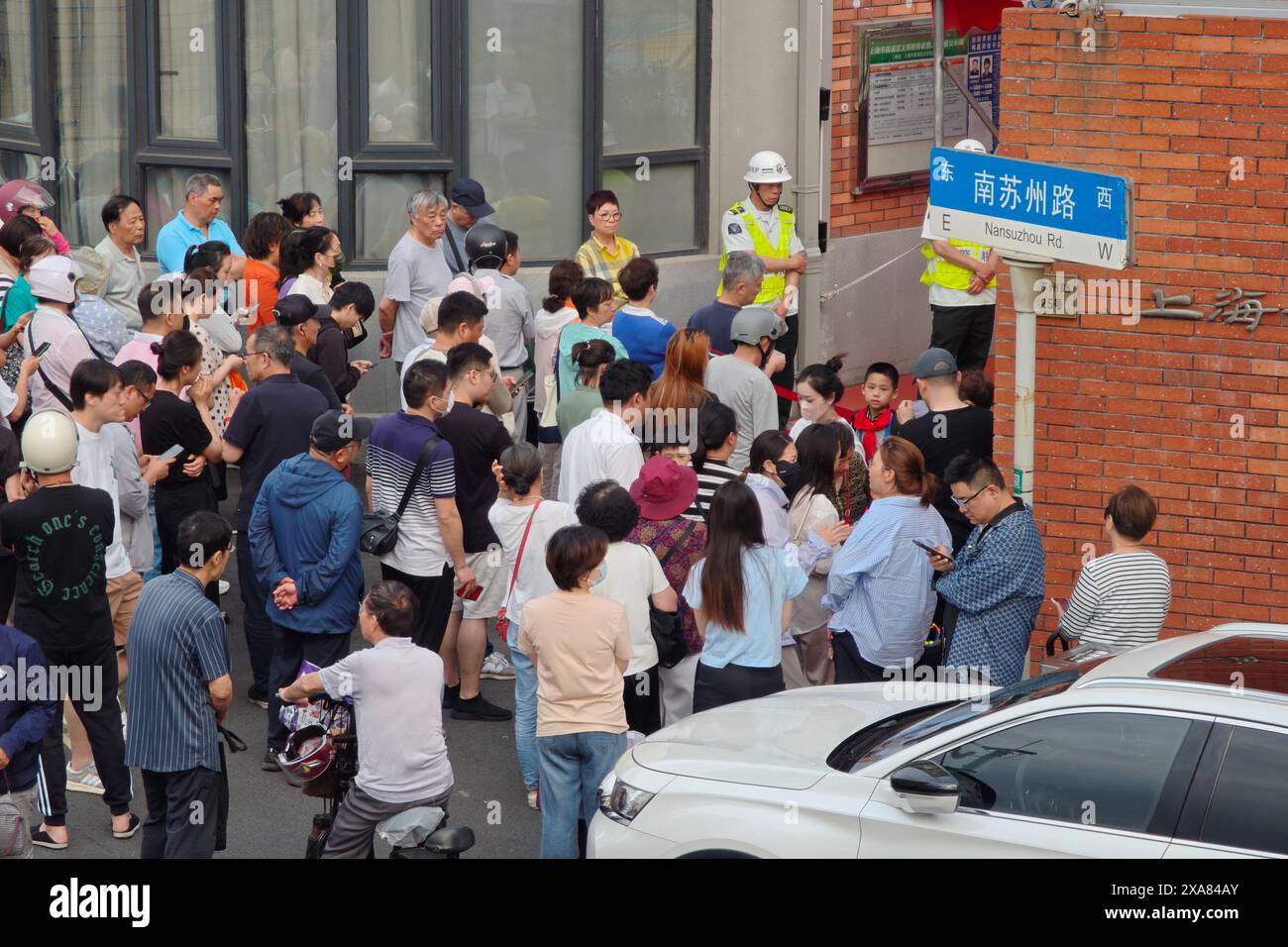 SHANGHAI, CHINA - JUNE 4, 2024 - Parents pick up their children from ...
