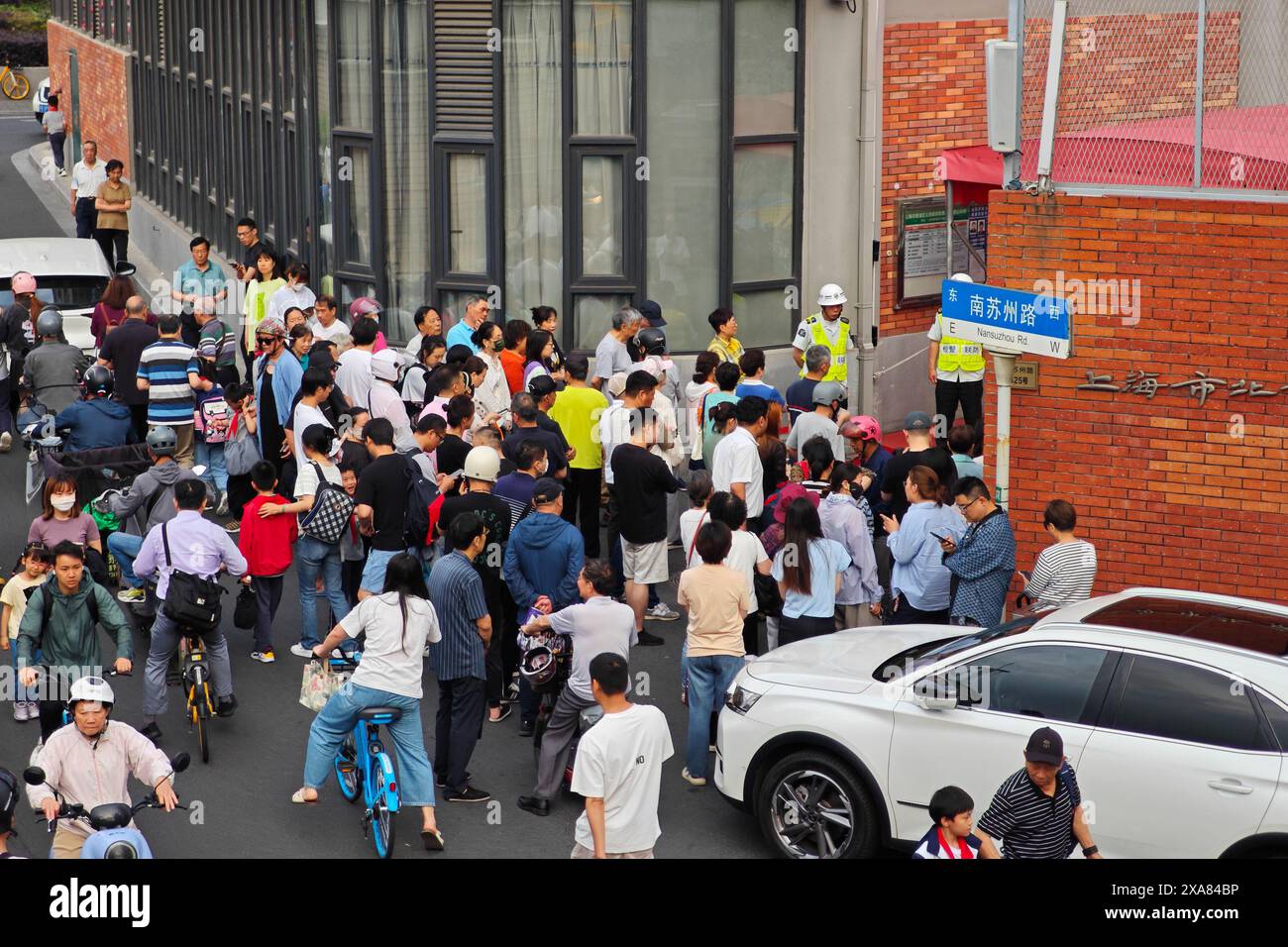 SHANGHAI, CHINA - JUNE 4, 2024 - Parents pick up their children from ...