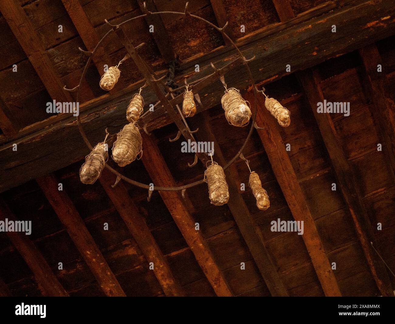 Salami curing in charming farmhouse, waiting for skilled chef. Rustic ...