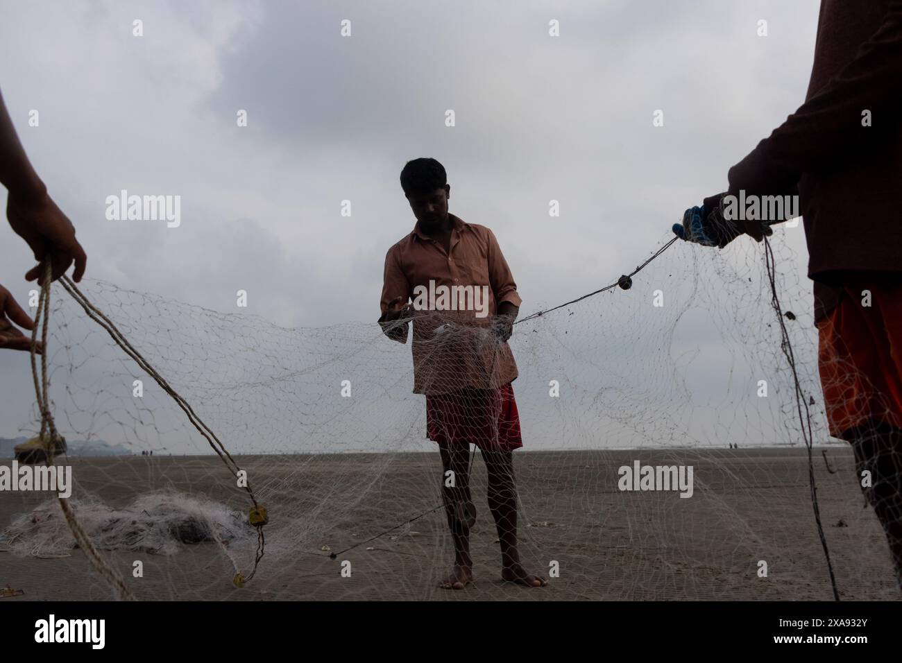 June 5, 2024, Cox's Bazar, Chittagong, Bangladesh: Fishermen preparing ...