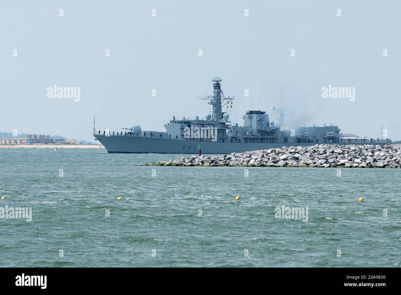 HMS St Albans fires her cannons for the 80th Anniversary DDay