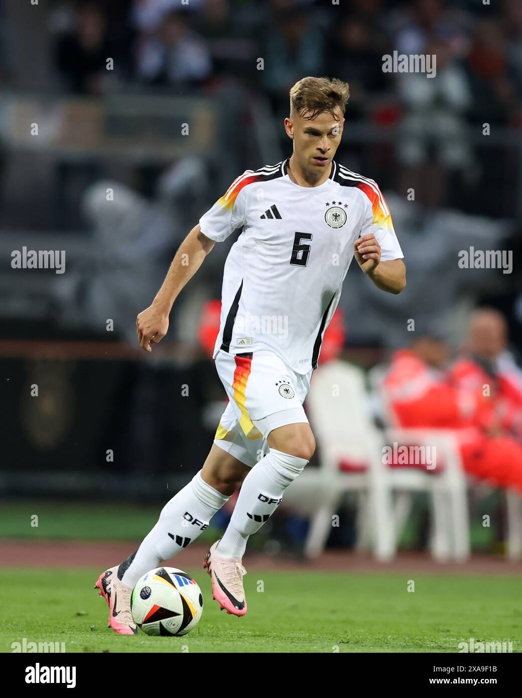 NUREMBERG, GERMANY - JUNE 03: Joshua Kimmich of Germany runs with a ...