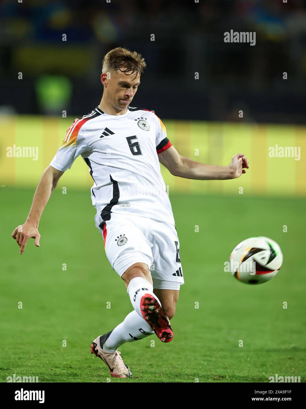 NUREMBERG, GERMANY - JUNE 03: Joshua Kimmich of Germany runs with a ...