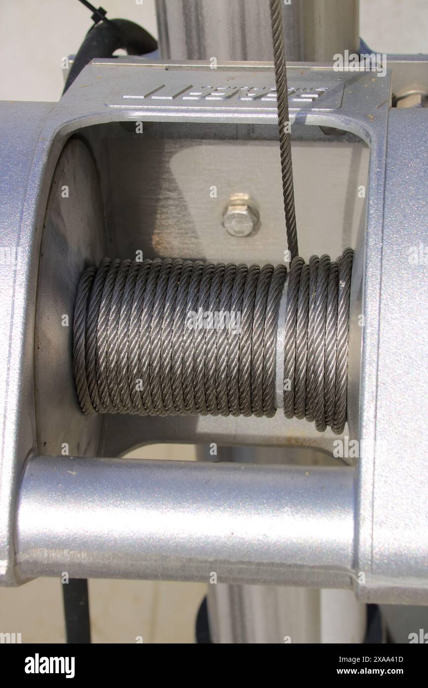 Wire rope from a winch is wound up side by side Stock Photo - Alamy