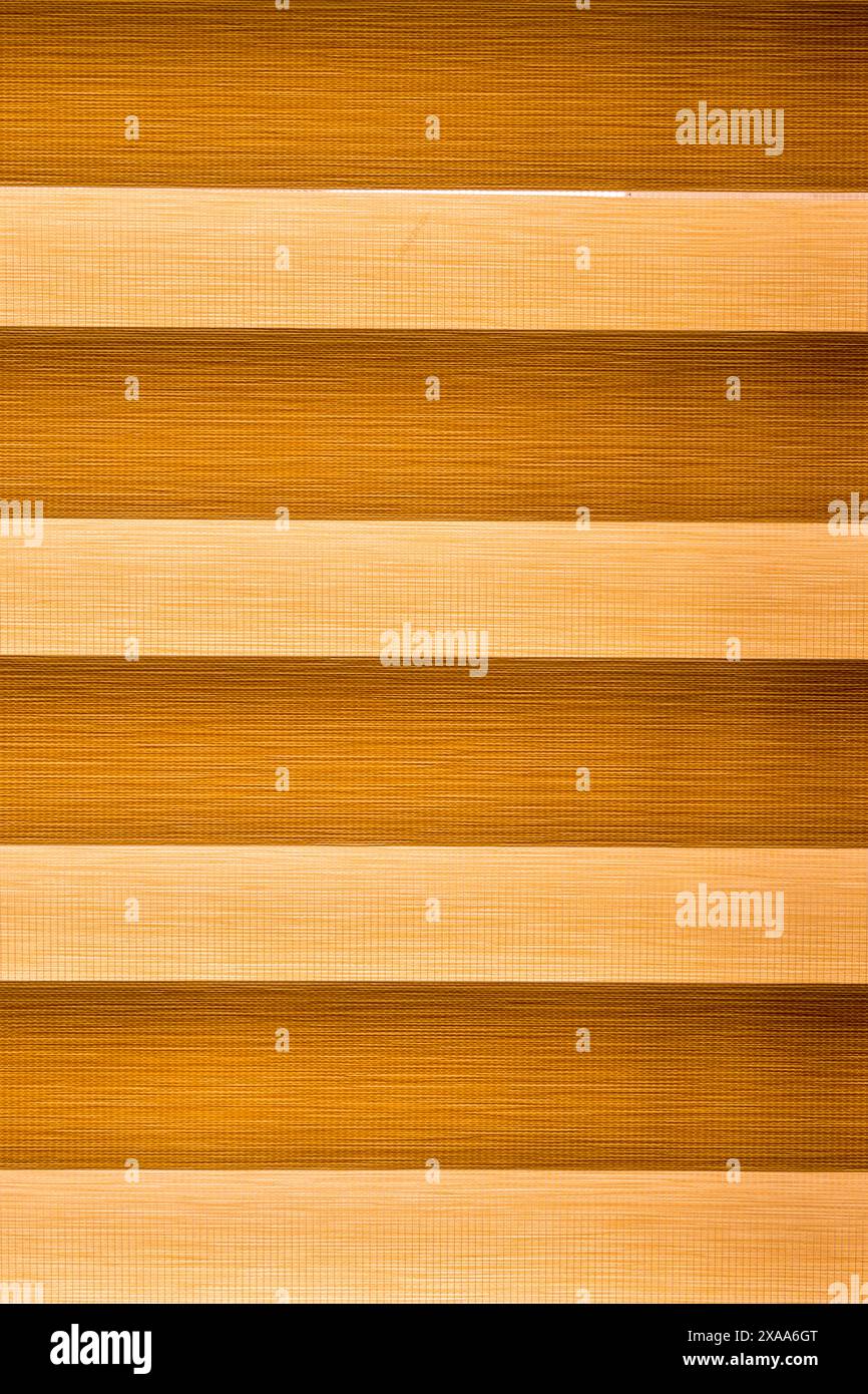 A brown and yellow striped backdrop with grid textures Stock Photo